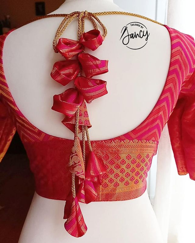 Classy Blouse Back Neck Design With Rose Petals And Cone Tassels - Keep ...